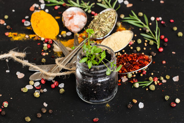 Fototapeta na wymiar Spices and herbs. Variety of spices and herbs on a wooden surface