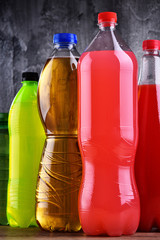 Plastic bottles of assorted carbonated soft drinks