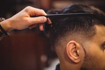 Man getting his hair trimmed