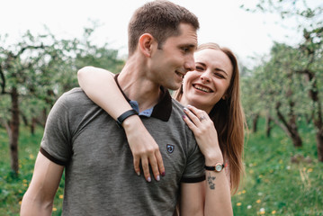 Nice outdorr portrait of young beautiful couple in love