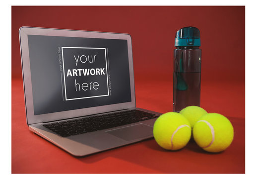 Laptop and Tennis Balls on Red Background Mockup