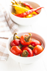 Pickled hot chili peppers.