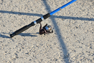 Fishing rod with hook and worms ready for use