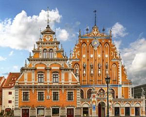 Riga, Latvia. Schwabe House And House Of The Blackheads At Town Hall Square, Ancient Historical Landmark And Popular Touristic place In bright summer day