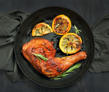 Barbecue chicken leg and roasted lemon