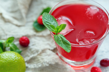 Glass with homemade cranberry morse closeup.