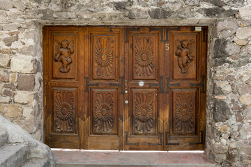 Carved wooden entrance doorway of a building, Zona Centro, San Miguel de Allende, Guanajuato, Mexico