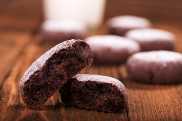 Chocolate cookies on a wooden background close up