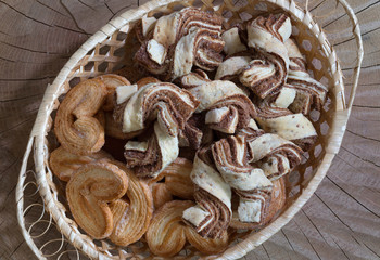 Chocolate cookies on a wooden background. Top view.