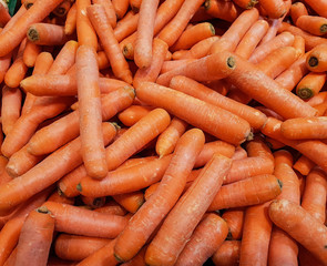 Many carrots are waiting to be sold