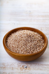 Raw pink rice in a bowl