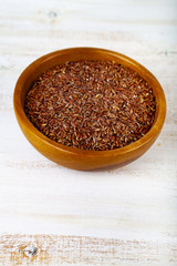 Raw red wild rice in a bowl