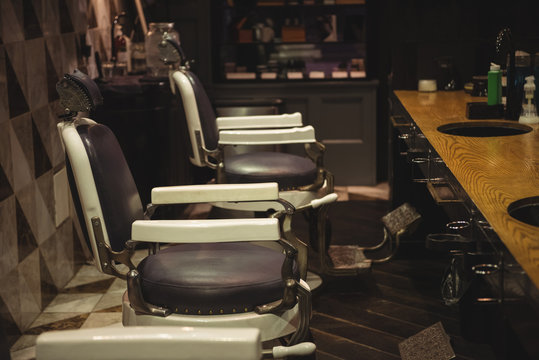 Barber chair arranged in a row