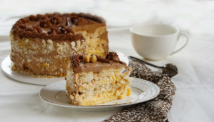 homemade kiev cake, dacquoise cake with butter cream and hazelnuts