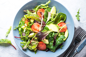 Fresh green salad top view.