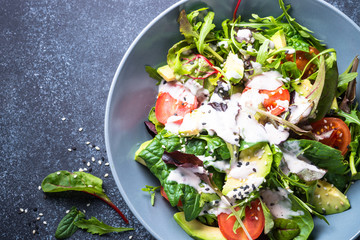 Fresh green salad top view.