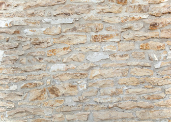 Alte vintage Steinmauer aus rustikalen Steinen