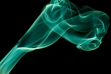 Colored smoke on black background