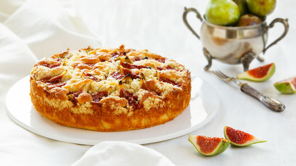 corn flour pie with figs, streusel, gluten free, without wheat, white bakeground silver 