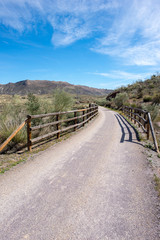 Fototapeta premium The green way of Lucainena under the blue sky in Almeria