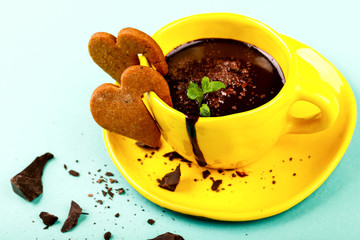 Hot Chocolate with Green Mint in a Yellow Cup Festive Drink for the Day of All Lovers Dessert on a Colored Background C