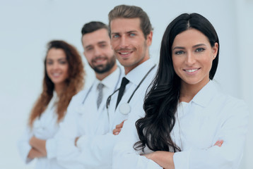 woman doctor on the background of colleagues