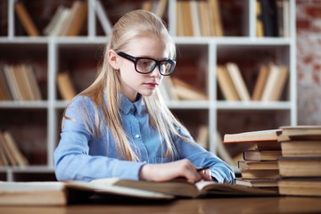 Teenage girl in a library