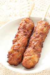 Japanese food, grilled mince chicken Tsukune on whtie background with copy space 