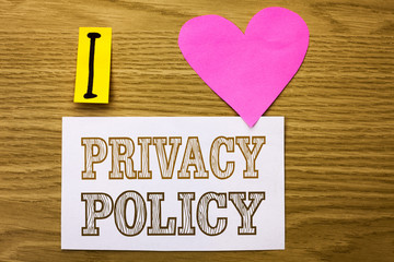 Word writing text Privacy Policy. Business concept for Document Information Security Confidential Data Protection written on Sticky Note Paper on the wooden background Pink Heart next to it.