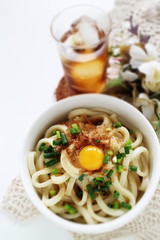Japanese food, quail egg and fish flake on udon noodles