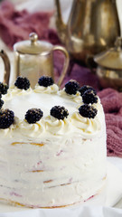 many layers cake with Vanilla Cream and blackberry, Cake Milchmädchen, milky girl , silver coffee pots