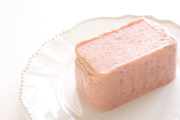 Sliced luncheon meat on dish