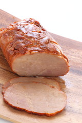 Chinese food, roasted pork on wooden plate