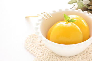 Canned food, peach on bowl