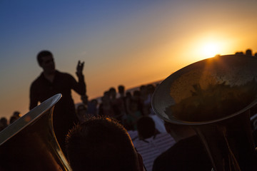 Philharmonic orchestra concert at sunset