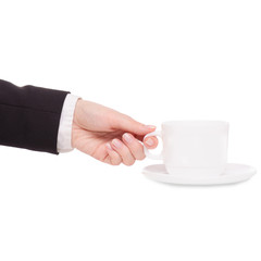 Cup of coffee tea and saucer in female hand business woman