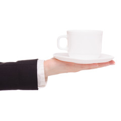 Cup of coffee tea and saucer in female hand business woman
