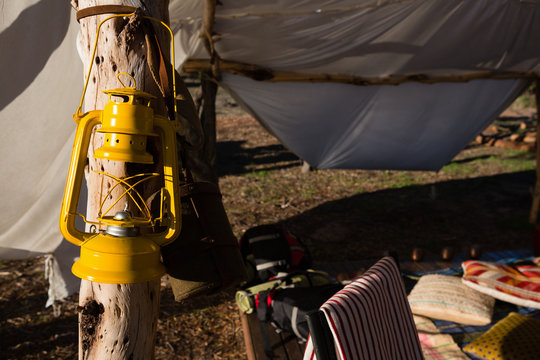 Oil lamp lantern on wooden post