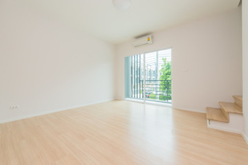 Empty bright living room without furniture