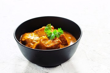 Homemade Paneer Tikka Masala on white background