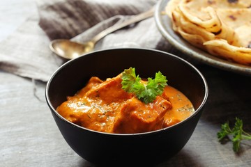 Homemade Paneer Butter Masala served with Paratha