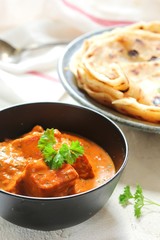 Homemade Paneer Butter Masala served with Paratha