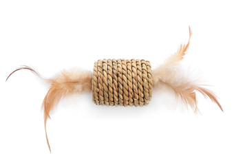 Straw toy with feathers for cat on white background, top view. Pet accessory