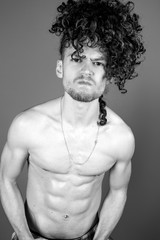 Fototapeta premium Young topless man studio portrait