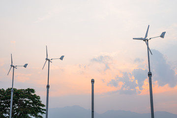 A windmill with a beautiful sunset backdrop nature