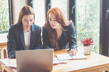 Business young woman agree to be partner,Sales manager are presenting export items to partner,Investors joint venture with customers,Secretary contacted the work successfully.