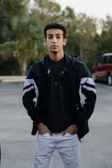 Obraz premium Young Male Modeling in Black and White Jacket