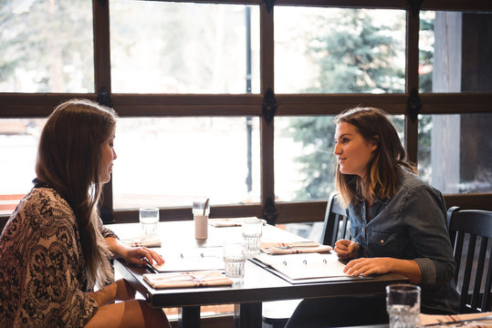 Friends sitting in a restaurant