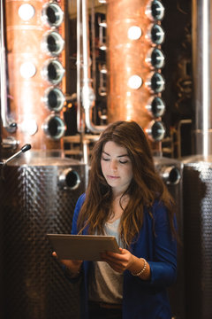 Woman working in beer factory
