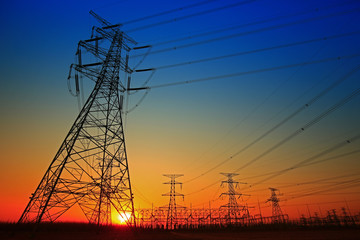 Fototapeta premium Pylon, high-voltage tower sky background.